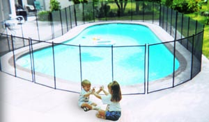 Kids Sitting in Front of Pool Fence